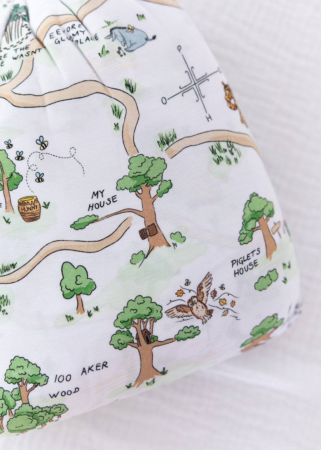 Winnie the Pooh Hundred Acre Wood bamboo crib sheet.