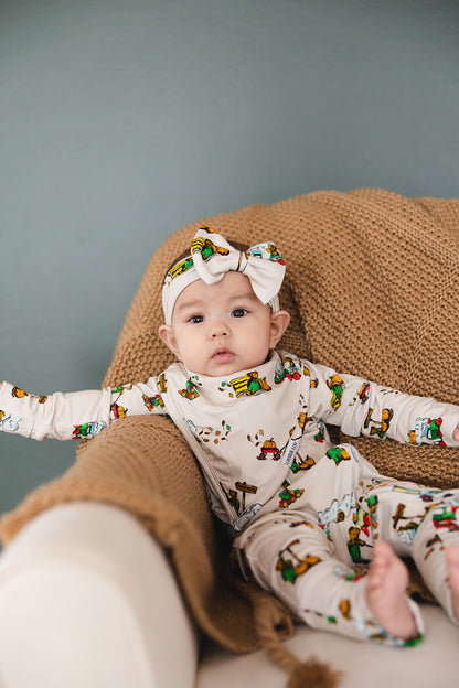 Corduroy book bamboo bib for babies, perfect for drool, teething and feeding baby boys and girls.