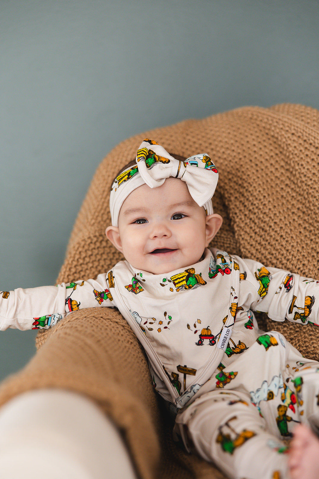 Corduroy book bamboo bib for babies, perfect for drool, teething and feeding baby boys and girls.