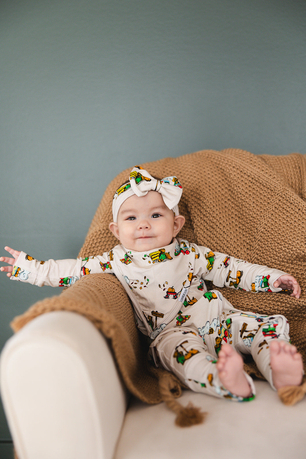 Corduroy book bamboo bib for babies, perfect for drool, teething and feeding baby boys and girls.