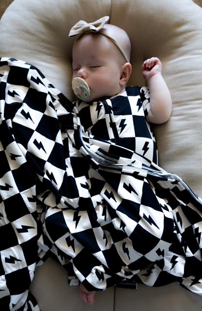 Big bamboo swaddle that is stretchy and soft for baby boys and girls.