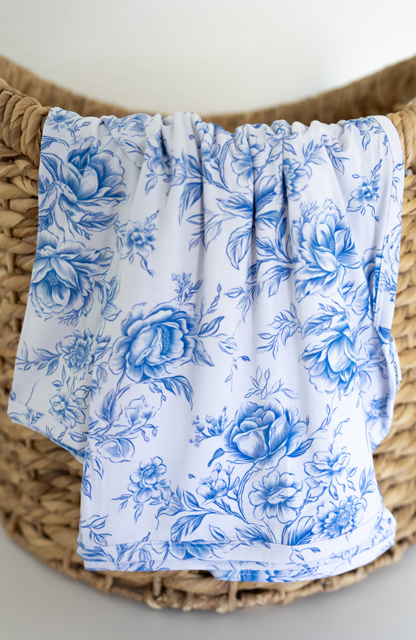 Blue floral toile bamboo swaddle for baby girl.