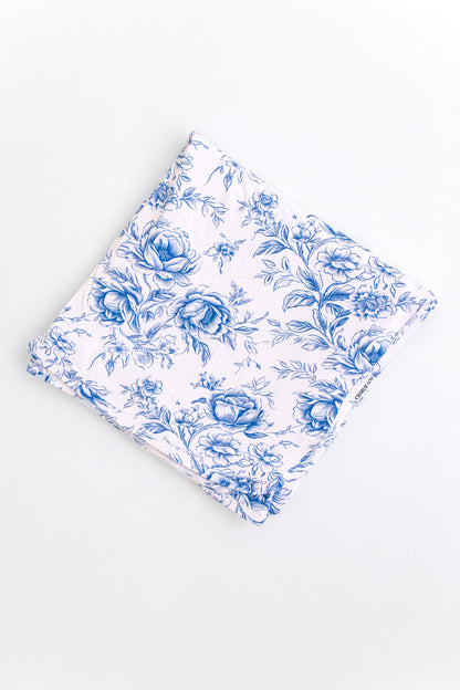 Blue floral toile bamboo swaddle for baby girl.