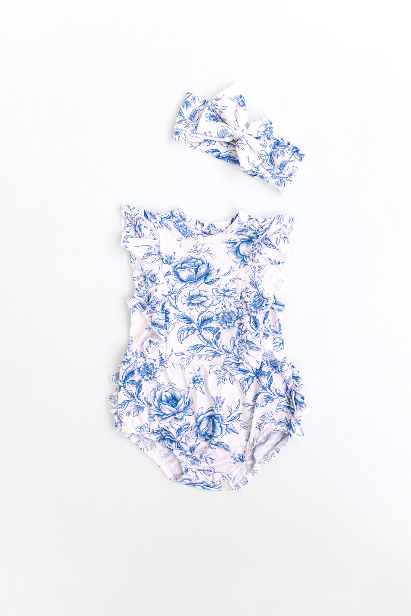 Blue toile bubble ruffle bodysuit in bamboo fabric for baby girls.