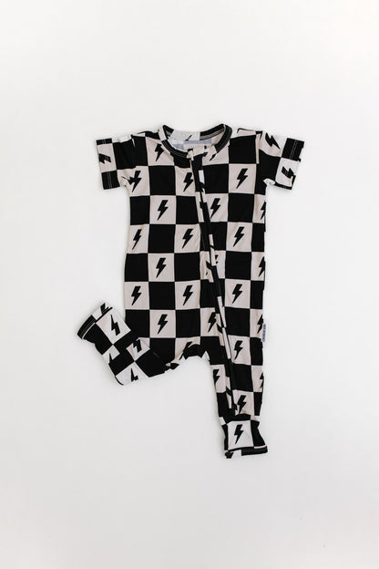 Bamboo double zipper romper with short sleeves and a checkered and lightning bolt print for boys and girls.