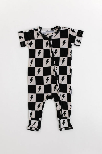 Bamboo double zipper romper with short sleeves and a checkered and lightning bolt print for boys and girls.