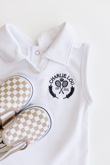 Baby girls and toddler girls white tennis dress made from bamboo with bodysuit underneath.