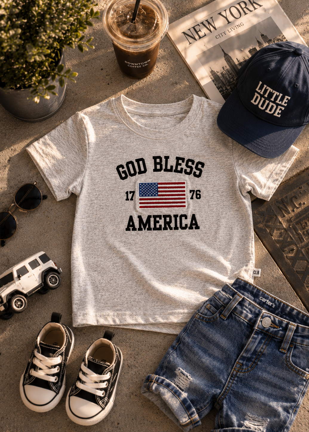 God Bless America 4th of July organic cotton embroidered t-shirt for baby, toddler, and little kids.