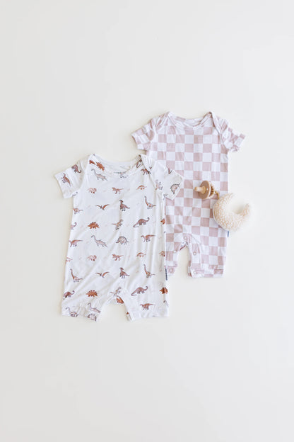 Gender neutral short sleeve romper with crotch snaps made from bamboo with neutral checkered print for boys and girls.