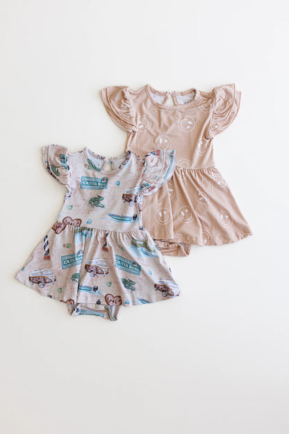 Gender neutral bamboo twirl dress for baby girls or toddler girls in Outer Banks OBX print with bodysuit.