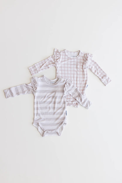 Ruffle bamboo bodysuit with crotch snaps and hand cuffs in neutral striped print for baby girls.