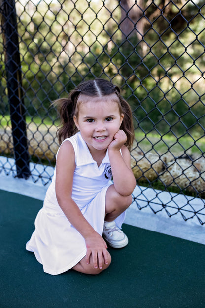 Baby girls and toddler girls white tennis dress made from bamboo with bodysuit underneath.