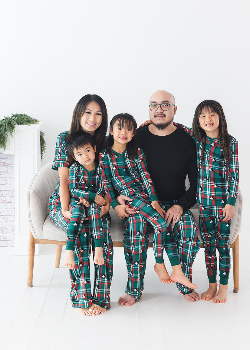 Family matching Christmas Mickey pajamas in bamboo fabric. Green and red Tartan.