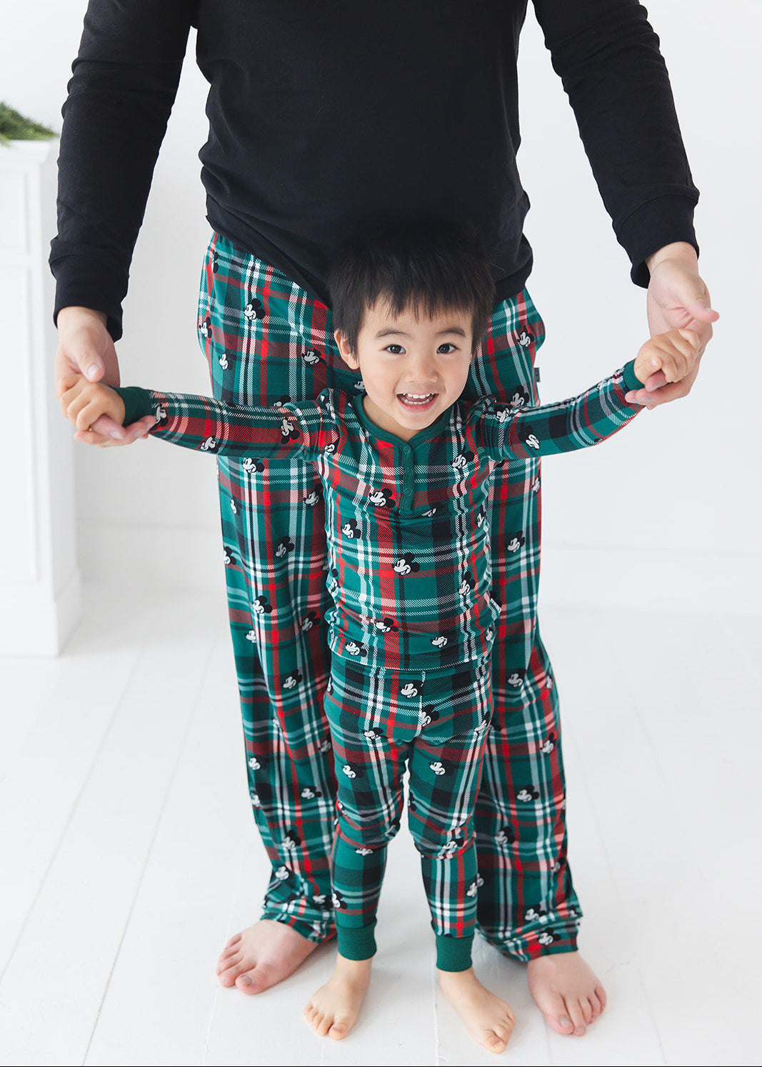 Men's bamboo Christmas Disney Mickey pajamas in green and red tartan print with family matching.