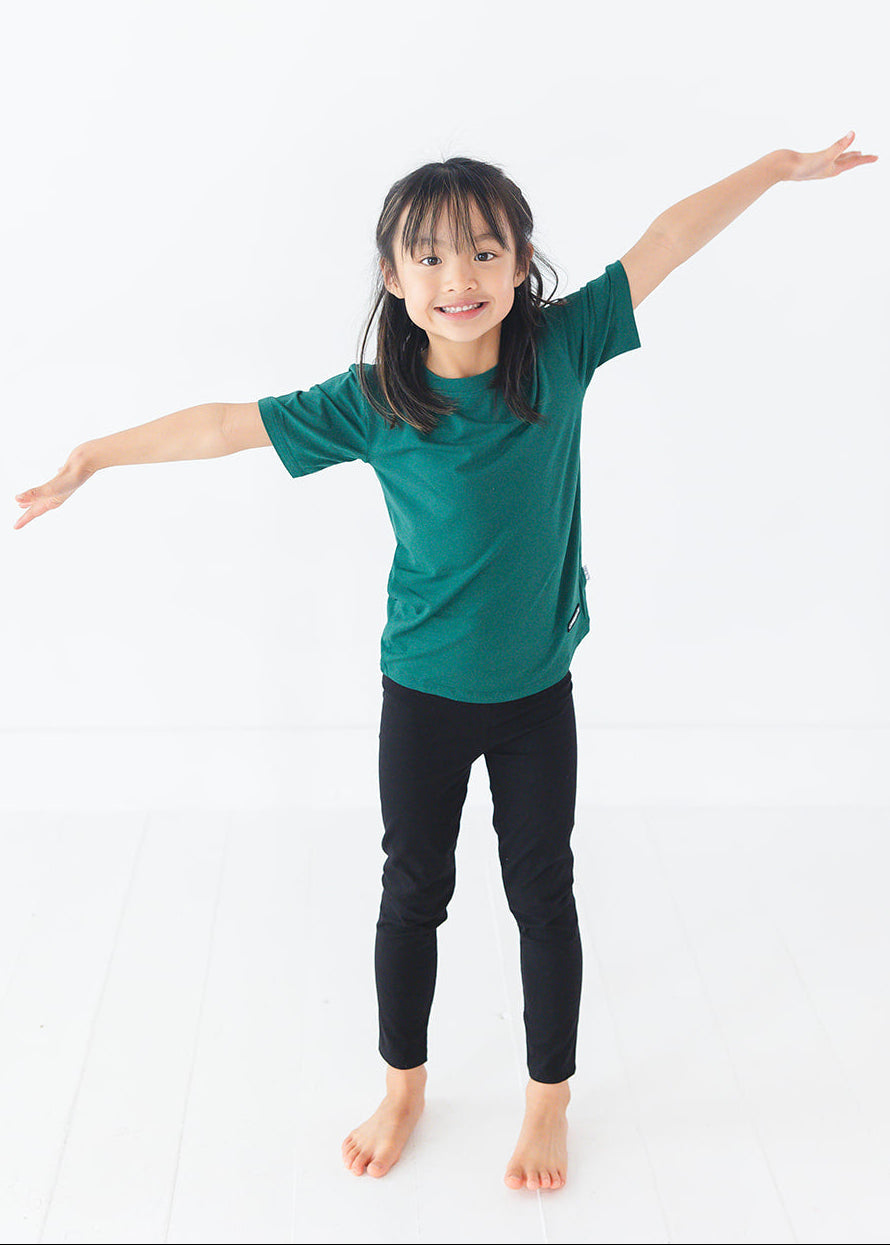 Forest green bamboo t-shirt with matching family Christmas pajamas.