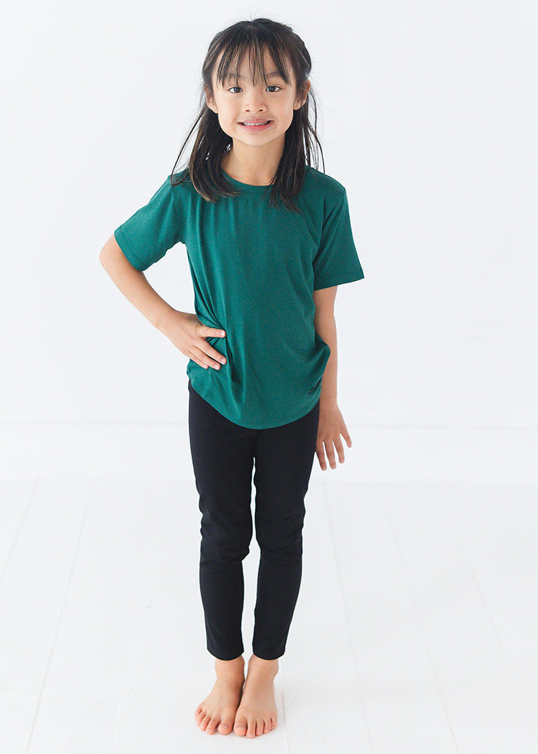 Forest green bamboo t-shirt with matching family Christmas pajamas.