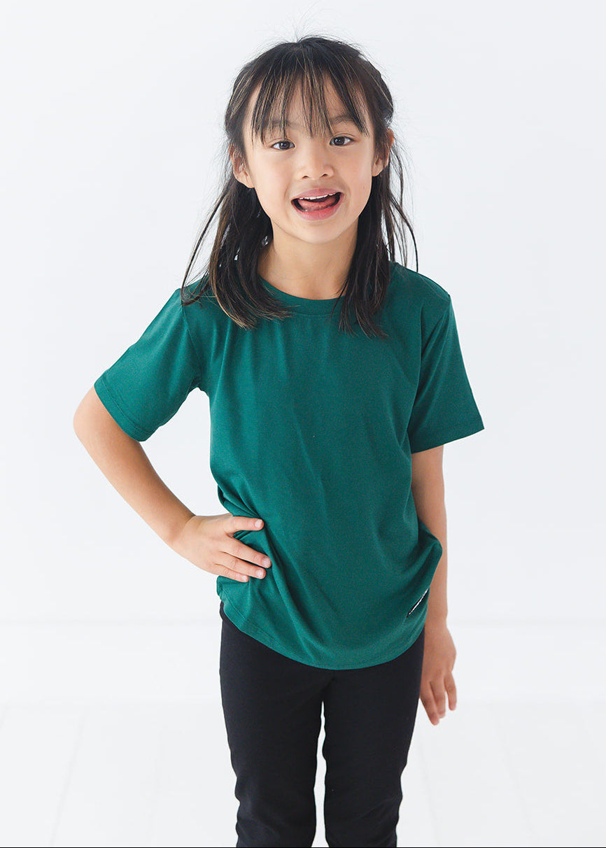 Forest green bamboo t-shirt with matching family Christmas pajamas.