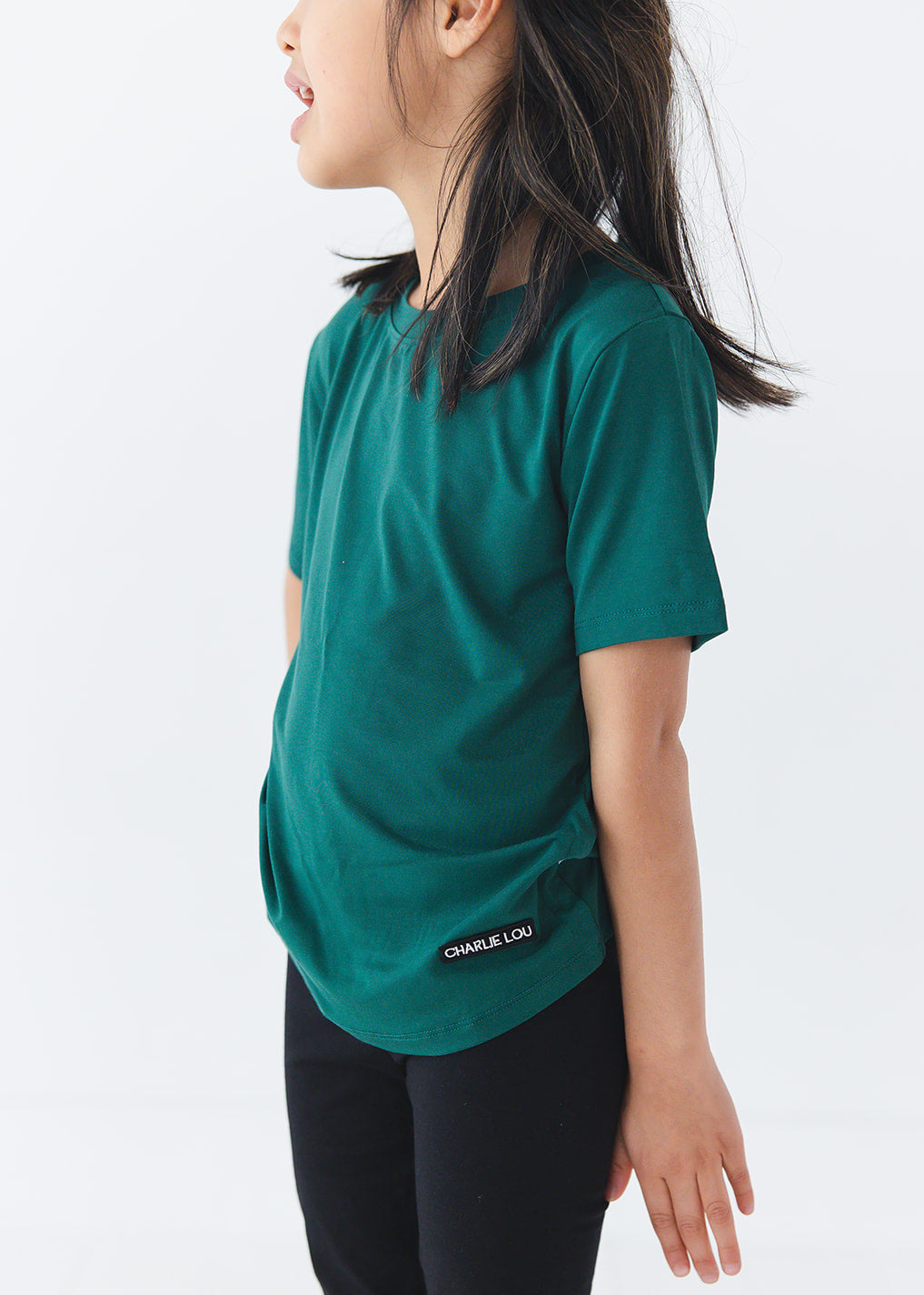 Forest green bamboo t-shirt with matching family Christmas pajamas.