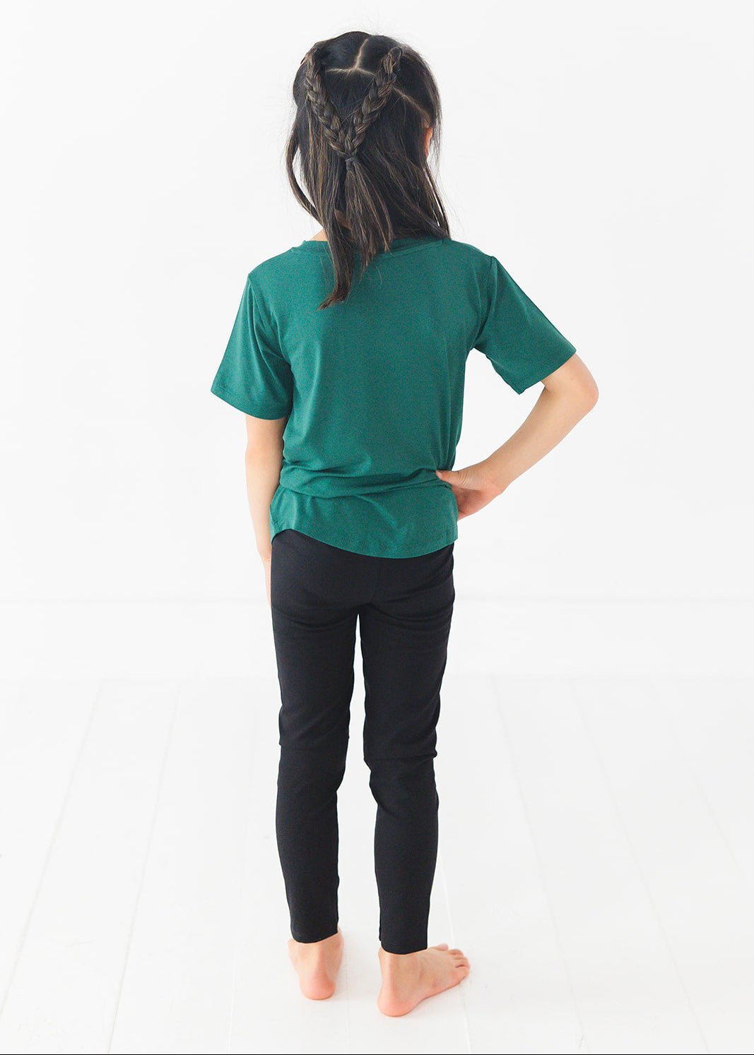 Forest green bamboo t-shirt with matching family Christmas pajamas.