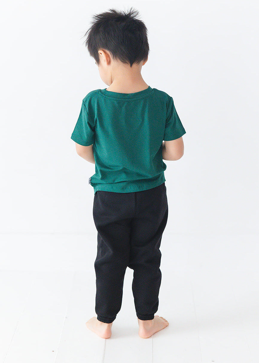 Forest green bamboo t-shirt with matching family Christmas pajamas.