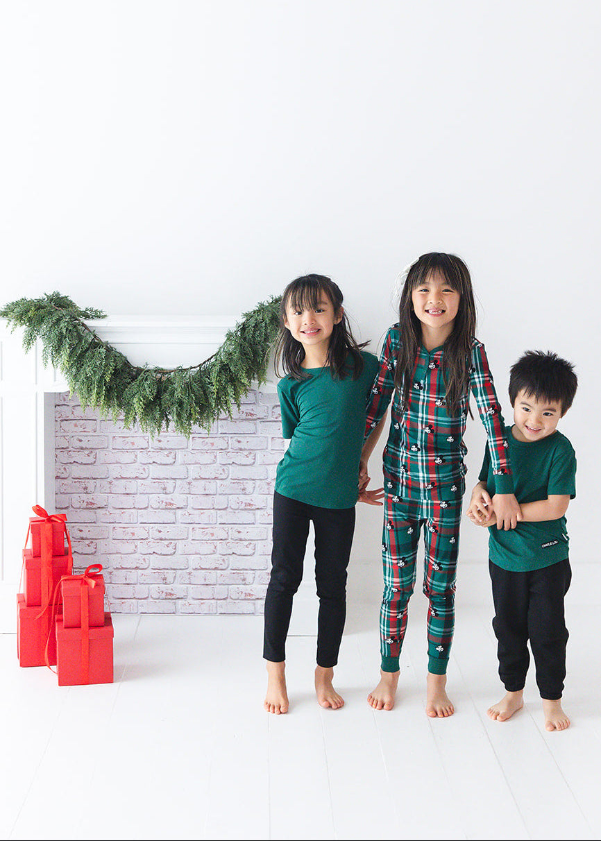 Forest green bamboo t-shirt with matching family Christmas pajamas.