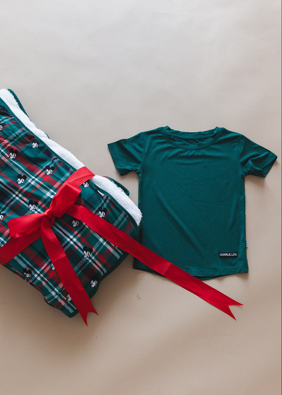 Forest green bamboo t-shirt with matching family Christmas pajamas.
