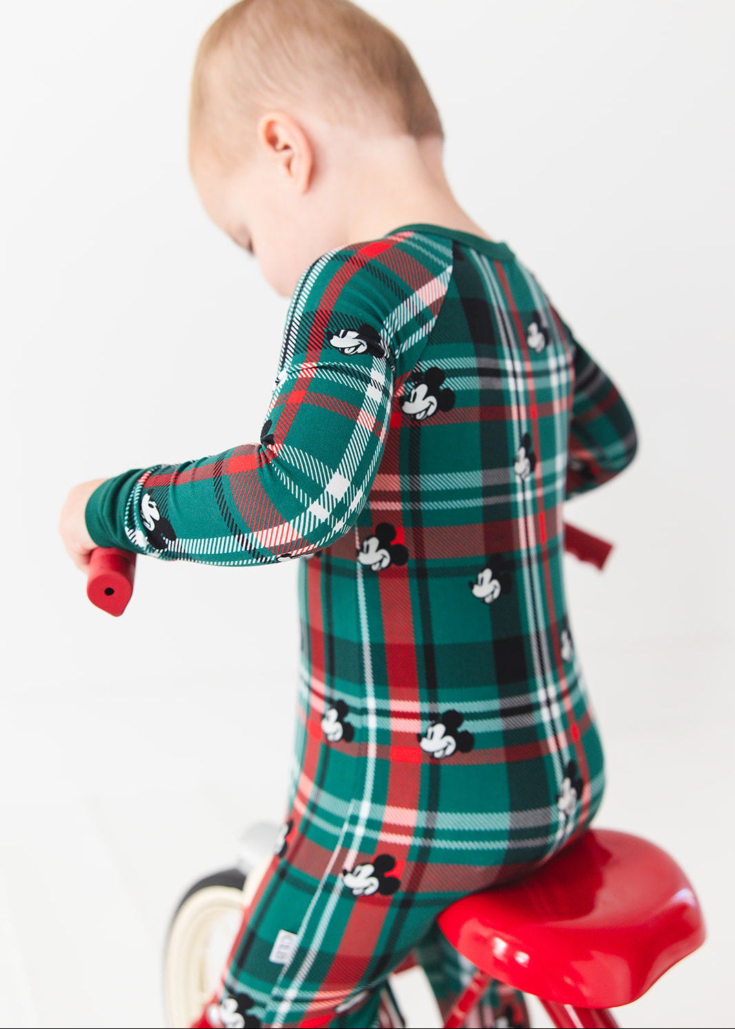Convertible romper in zippy style with green and red tartan mickey disney print for Christmas family matching pajamas.