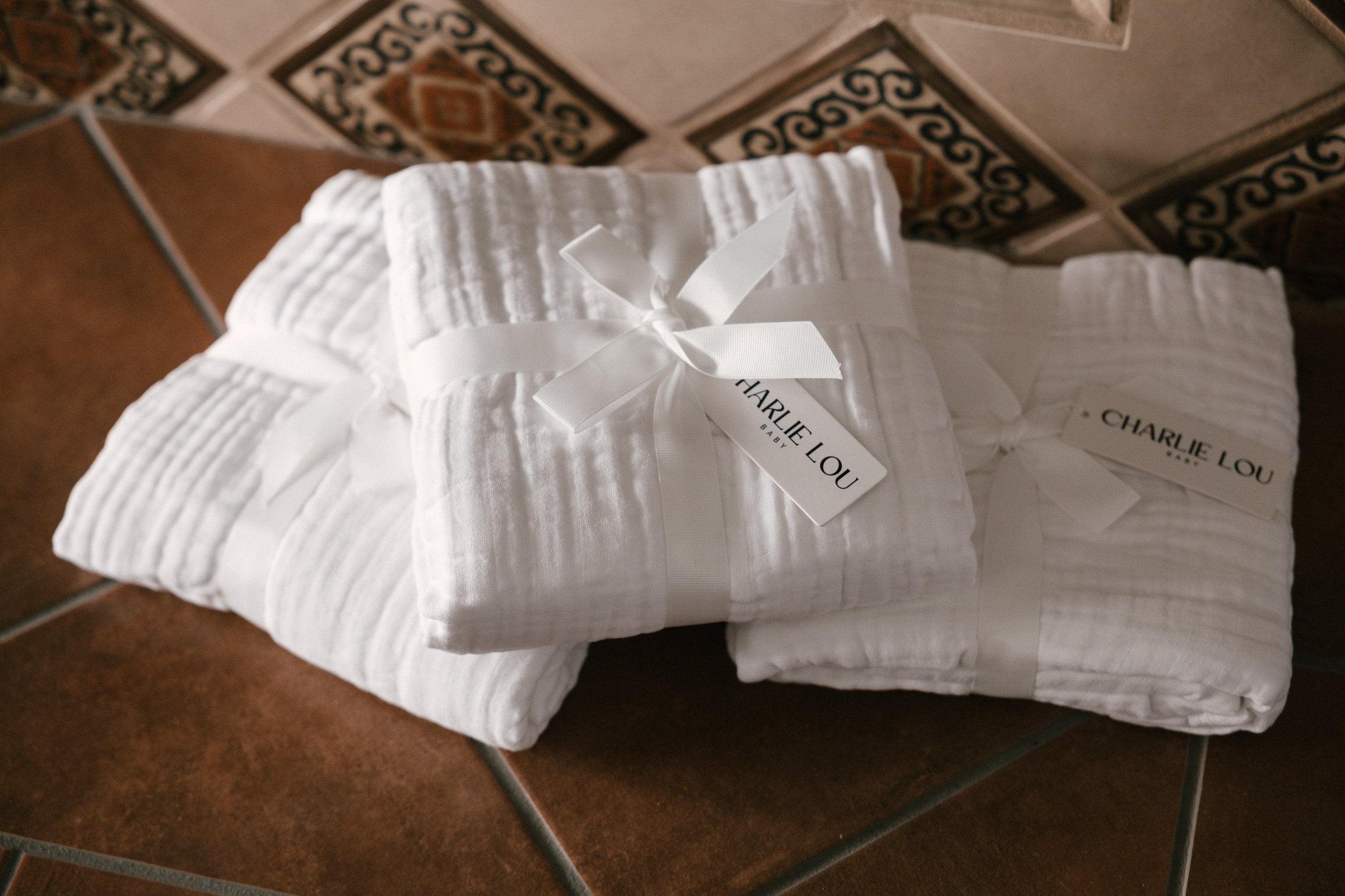 White 100% cotton muslin quilt, blanket or towel for baby girls, baby boys or toddlers.