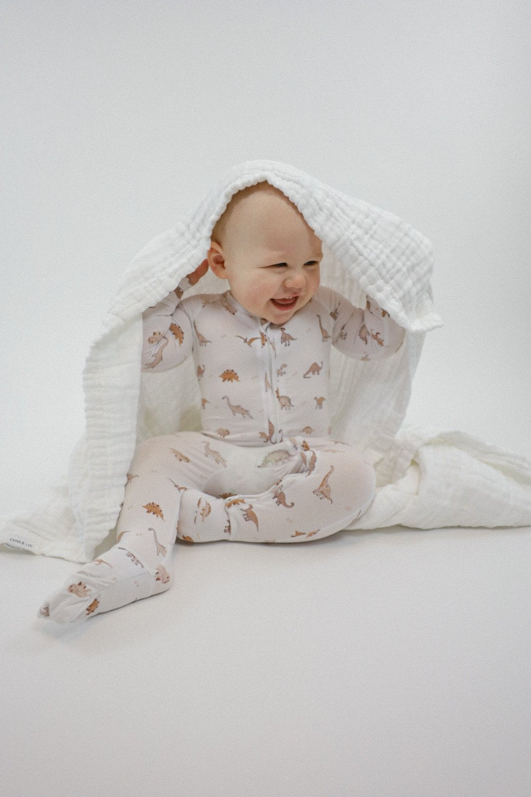 White 100% cotton muslin quilt, blanket or towel for baby girls, baby boys or toddlers.